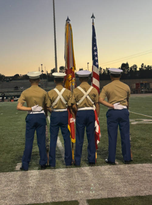 The USMC Color Guard stands ready at the Mission for Heroes game at Mission Viejo High School