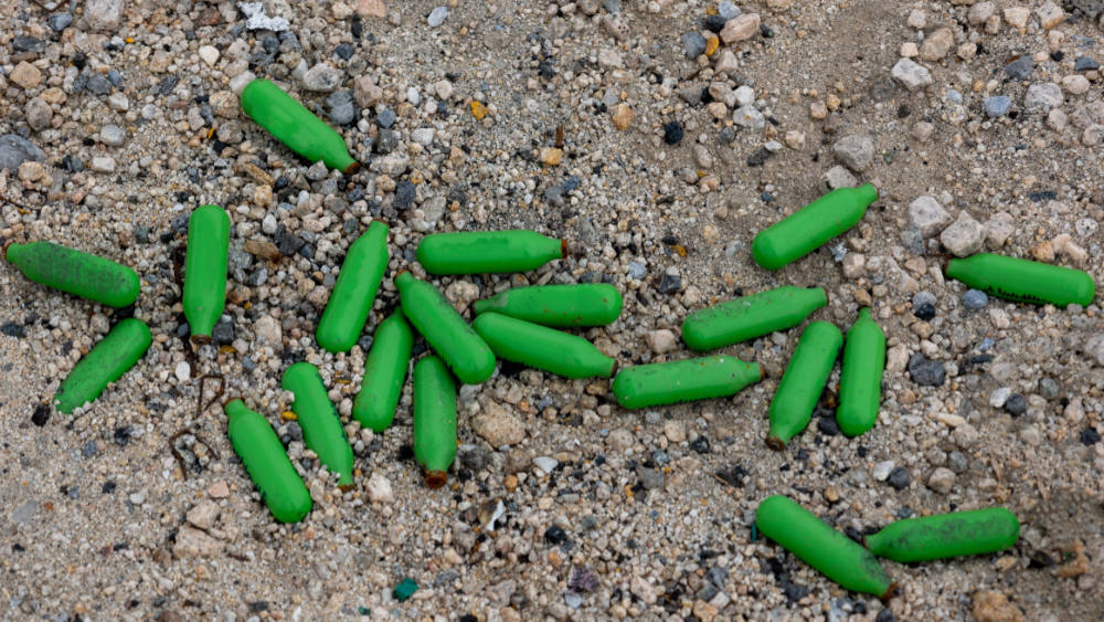 Used nitrous oxide canisters after a party in the California desert